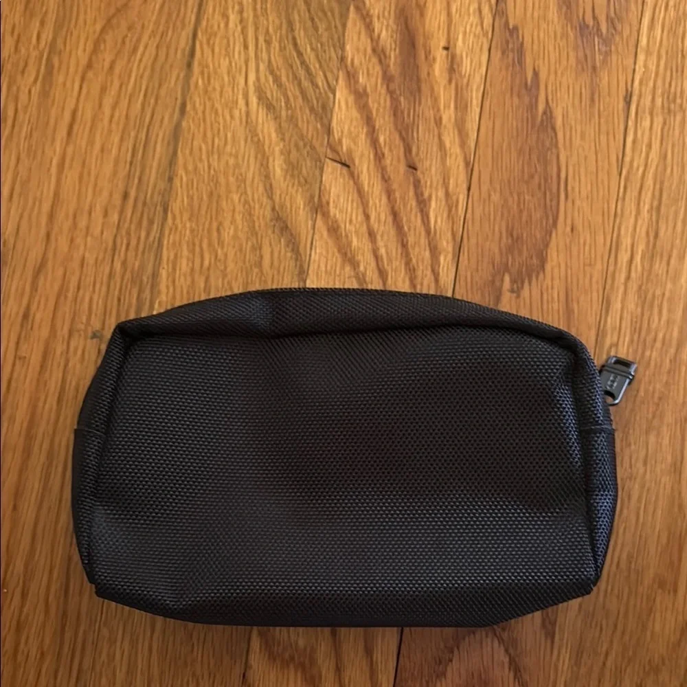 Tumi Black Zipper Travel Toiletry Makeup Pouch Bag